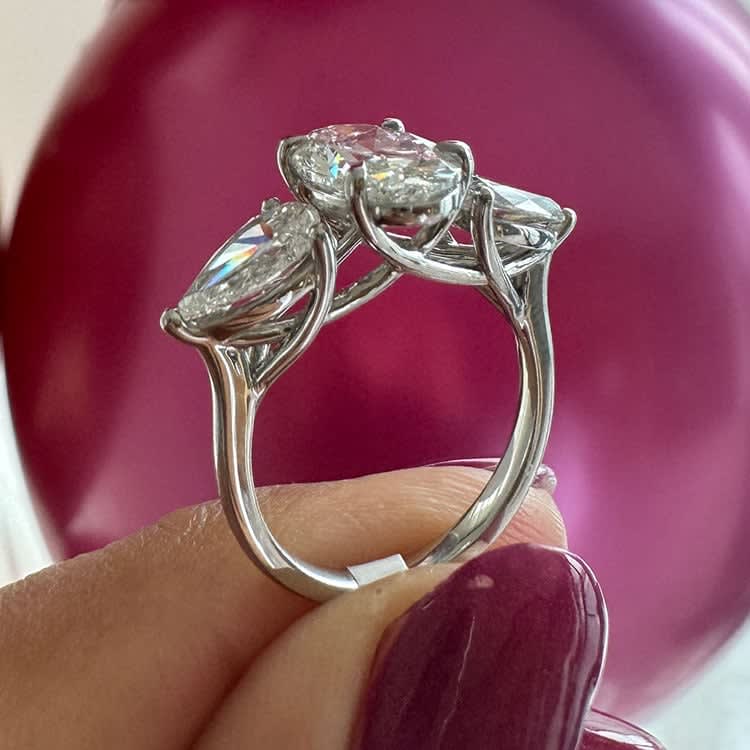 Oval with pear trilogy ring