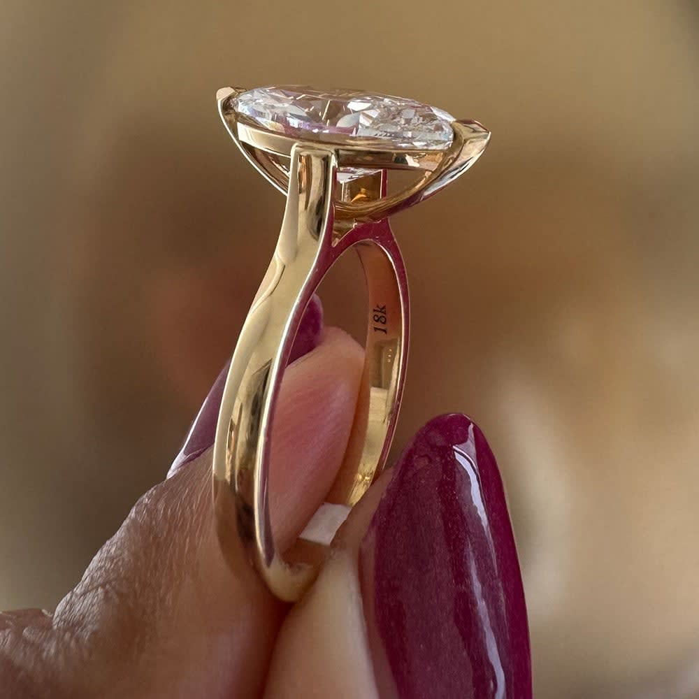 3ct Classic marquise on a gold band