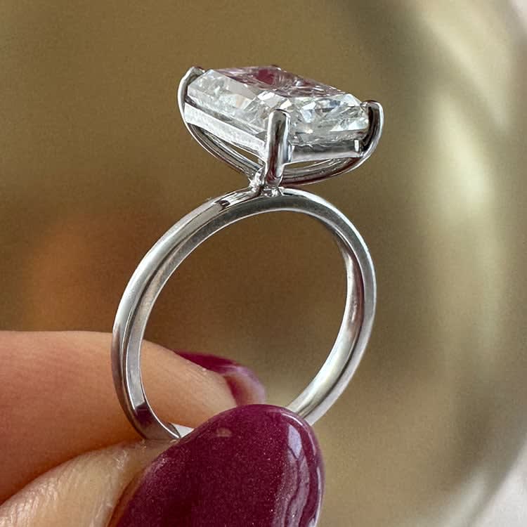 3 carat radiant on a plan band