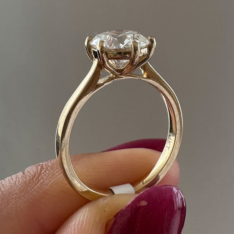 Classic 6 prong set with 2 carat round diamond