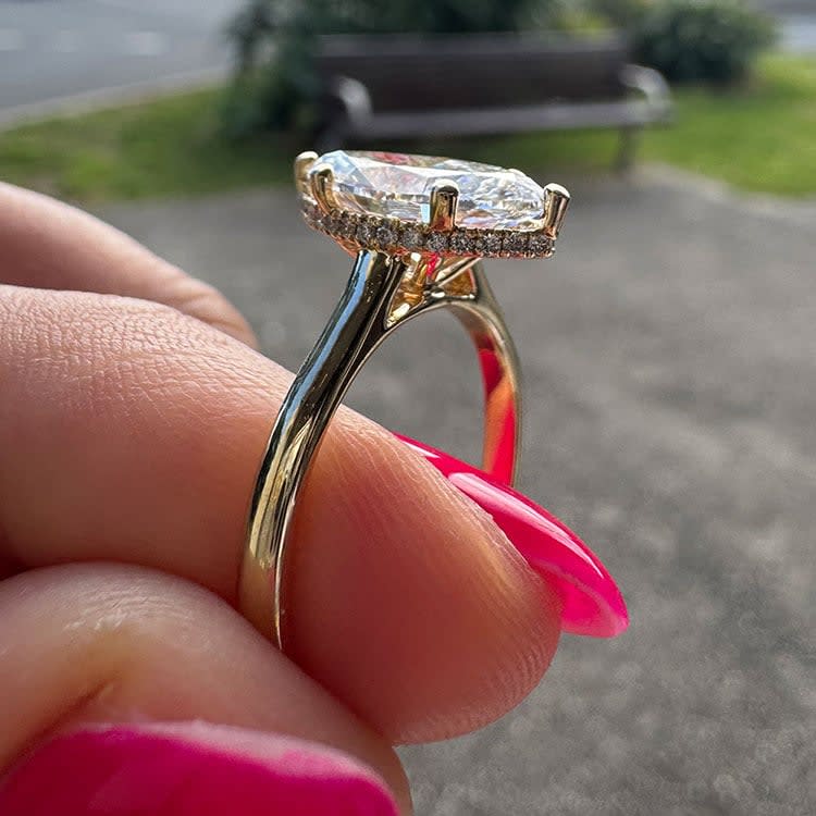Marquise diamond with a floating halo