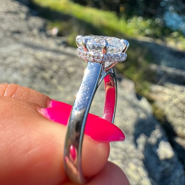 Oval diamond with a floating halo
