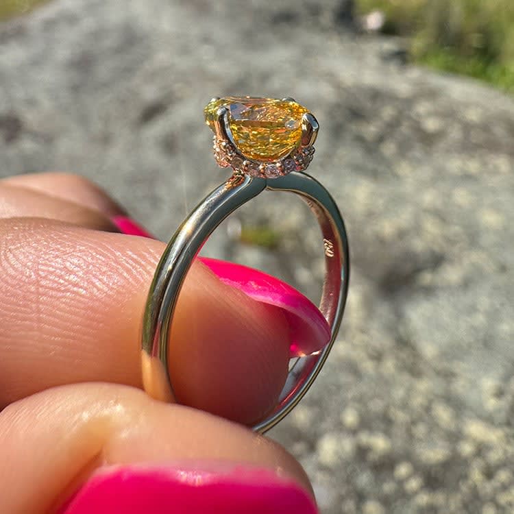 Fancy vivid yellow diamond ring