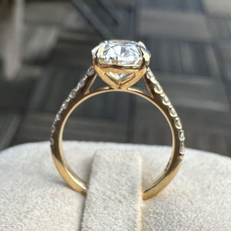 Yellow gold oval lab diamond with diamond band
