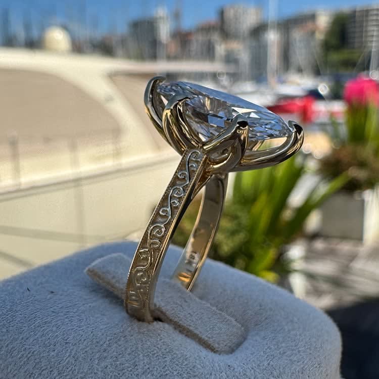 4ct moval in a tulip setting and vintage band