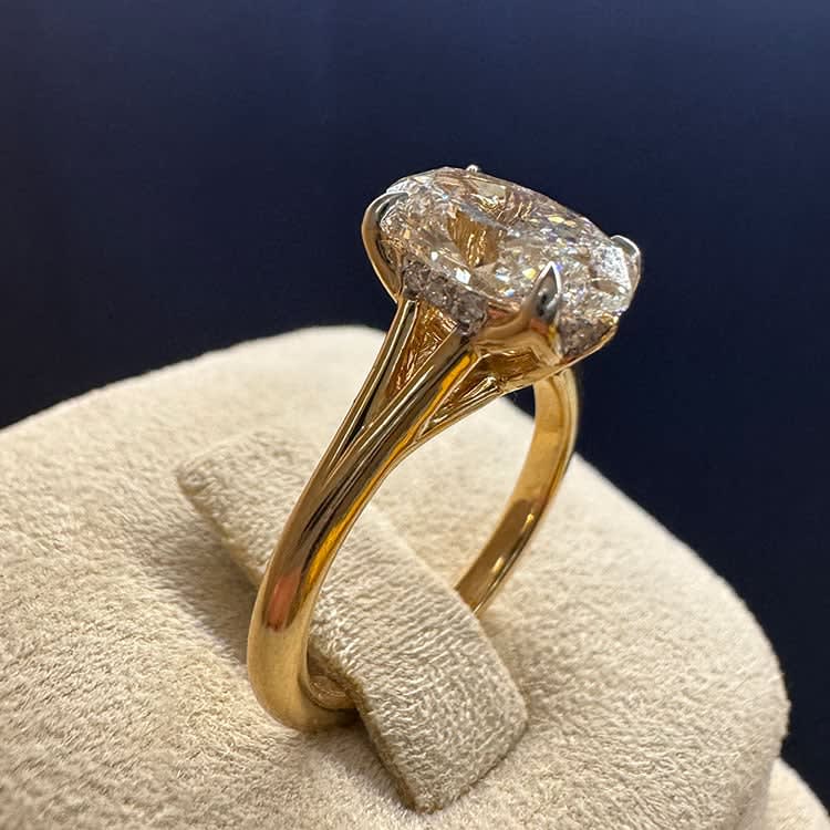 2 carat oval on a slight split gold band