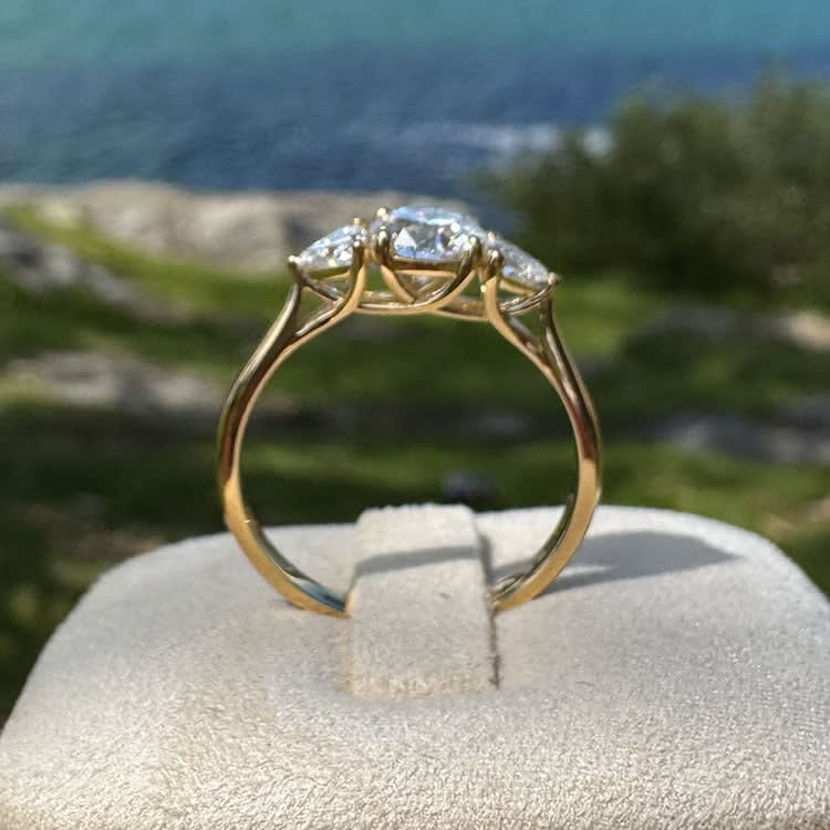 1 carat D VS1 round diamond in trilogy setting