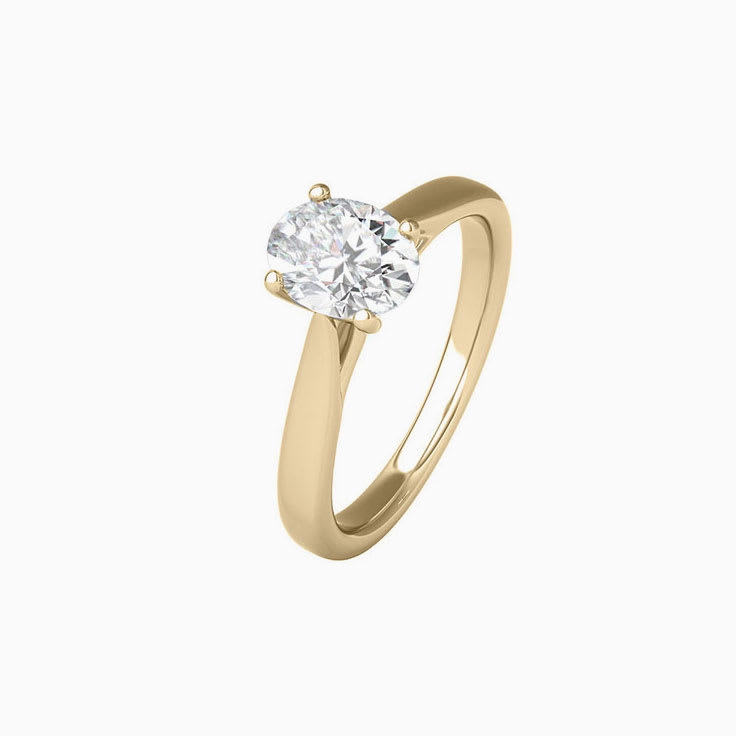 Oval solitaire Engagement ring on a plain band