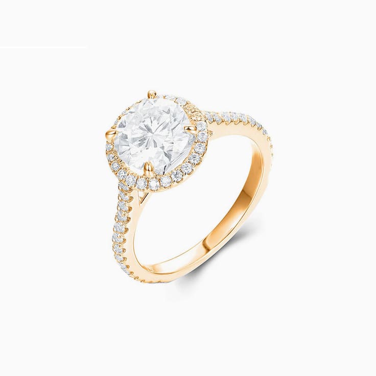 Classic Round Brilliant Engagment ring with a Diamond Halo