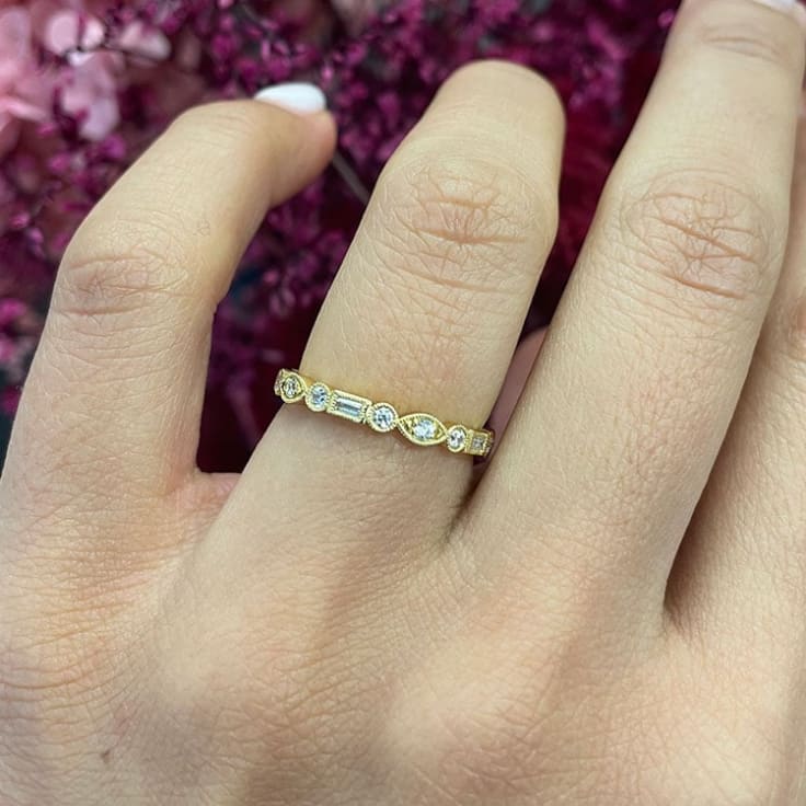 Baguette and Round Bezel set ring