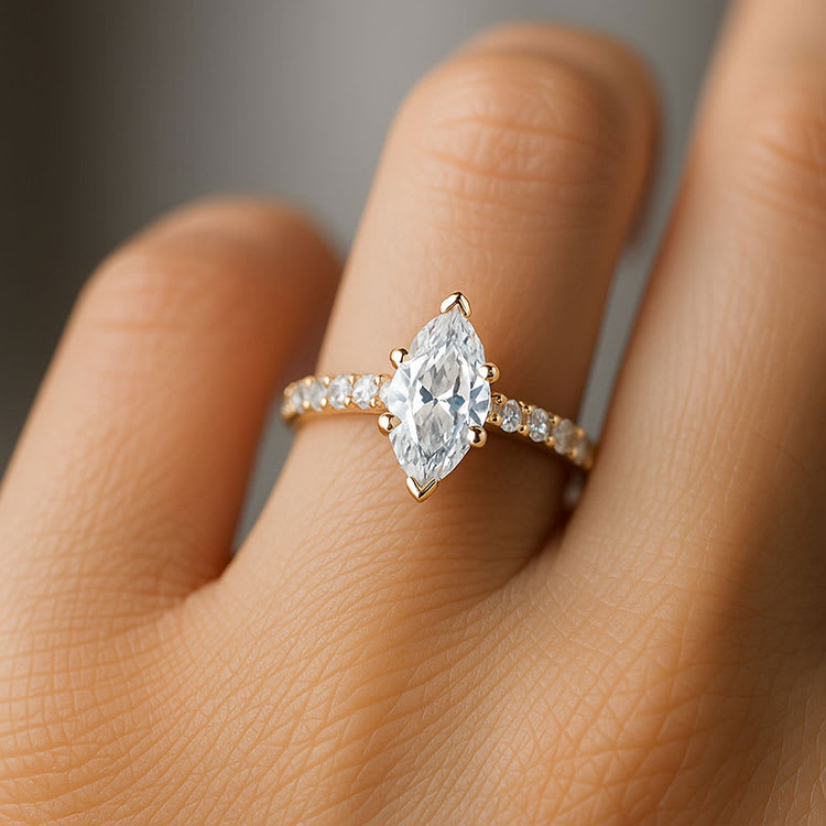 Marquise Cut diamond engagement ring on a diamond band