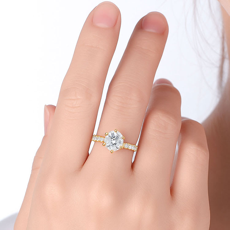 Six claw round brilliant cut engagement ring