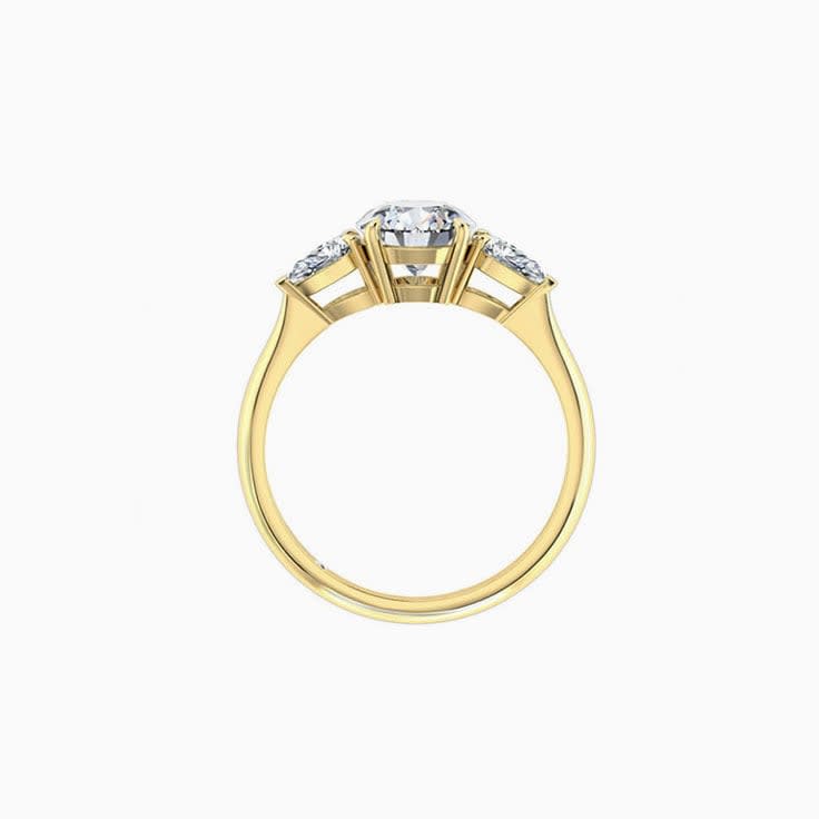 Round Diamond With side pear cut Engagement Ring