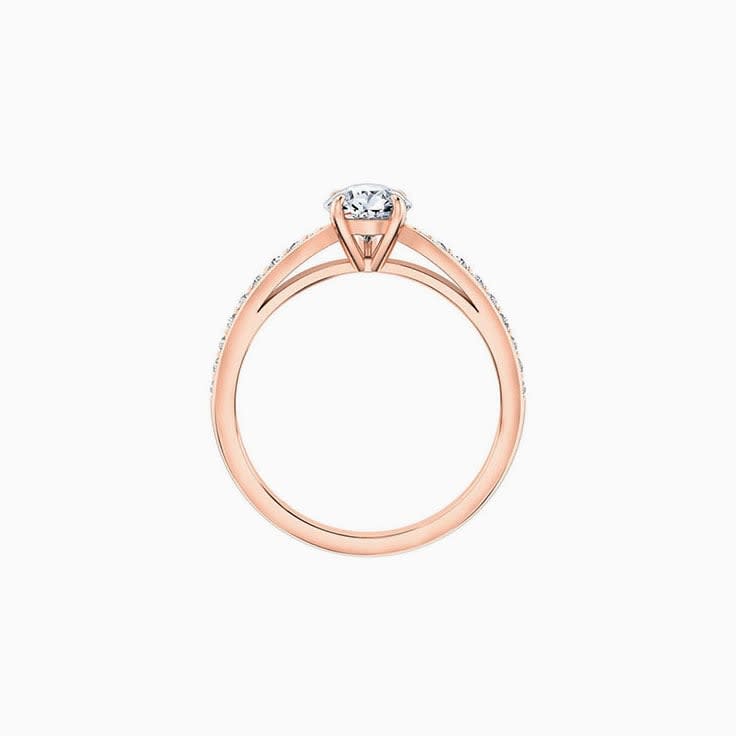 Pear cut diamond engagement ring on a diamond band