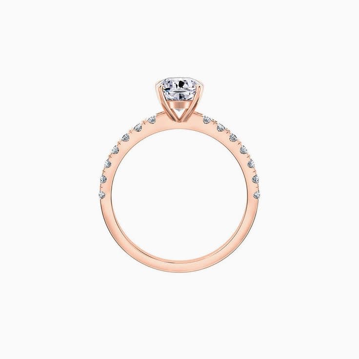 Cushion Cut Diamond Engagement Ring On A Pave Band