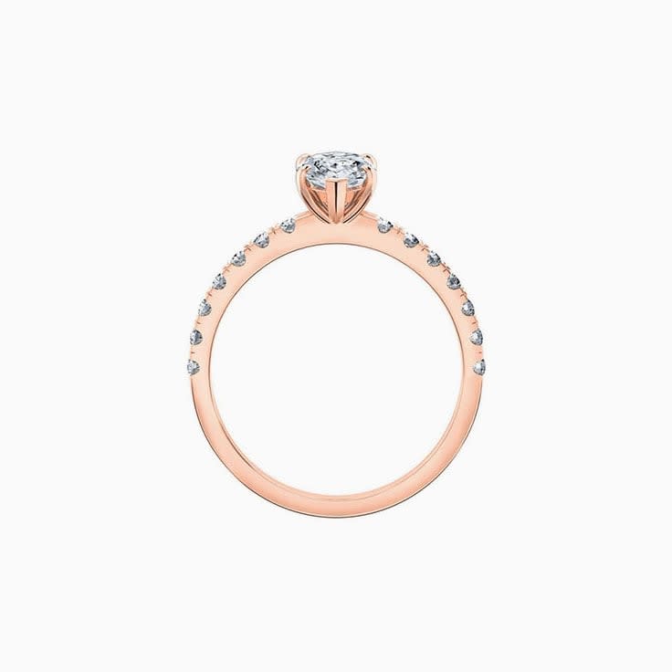 Marquise cut diamond engagement ring with diamond band