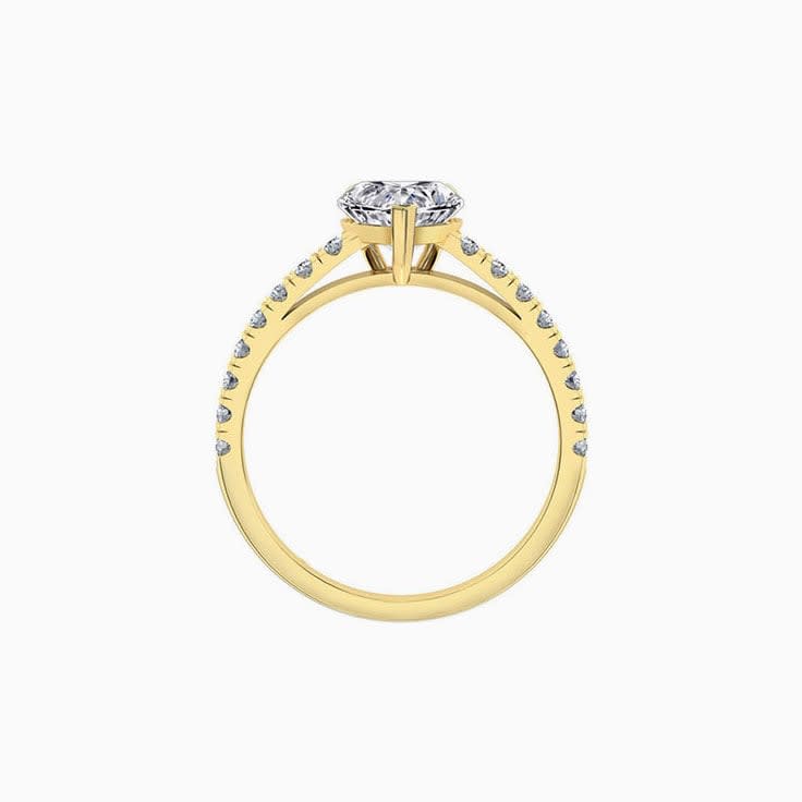 Heart shape diamond engagement ring on a diamond band