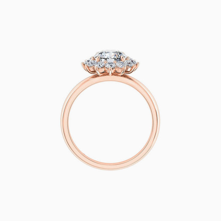 Round brilliant cut engagement ring with floral halo setting