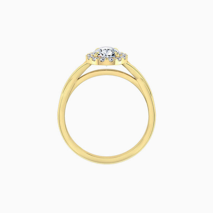 Pear cut engagement ring on a twisted plain band