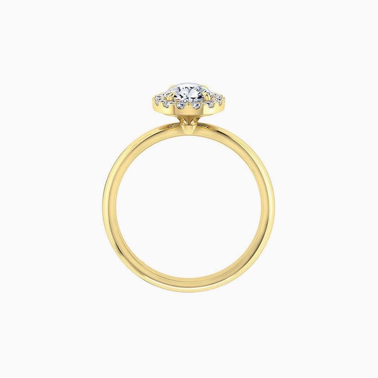 Pear diamond engagement ring with a diamond halo