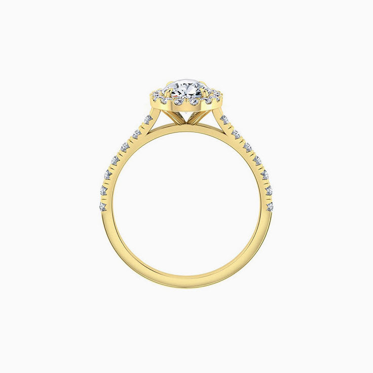 Pear cut diamond engagement ring with halo and diamond band