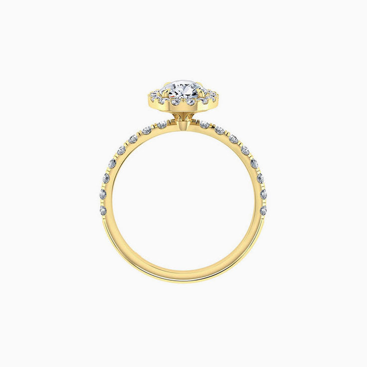 Pear cut diamond engagement ring with halo