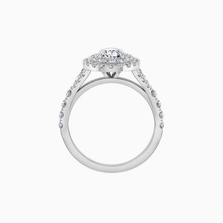 Pear cut engagement ring with double halo and split band