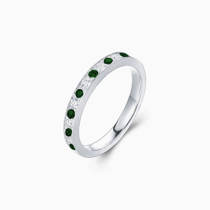 Emerald and pave band