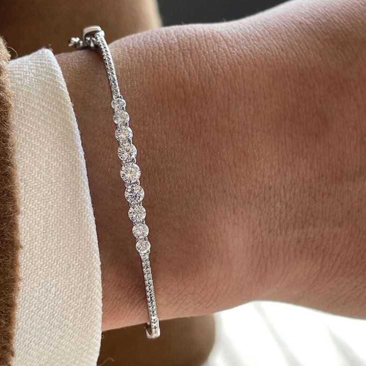 Claw set diamond bangle